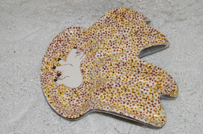 +MBADG #31-011  "1986 Hand Painted Floral & Pig Motif Spoon Rest"